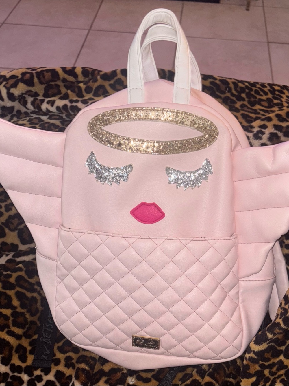 Betsy Johnson- The Luv Betsy Pink Quilted Angel Face Mini backpack with Glitter